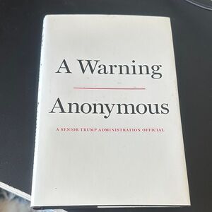A Warning by Anonymous - White Hardcover Book